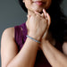 woman modeling round labradorite beaded stretch bracelet