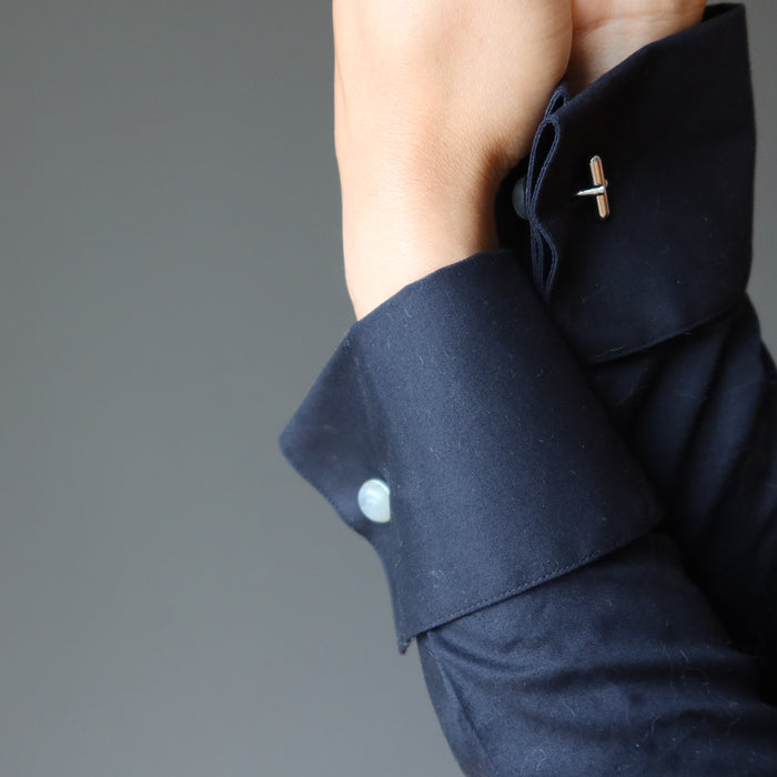 labradorite cufflinks on woman wearing black french cuff shirt