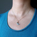 sheila of satin crystals wearing faceted labradorite crescent moon gold chain necklace
