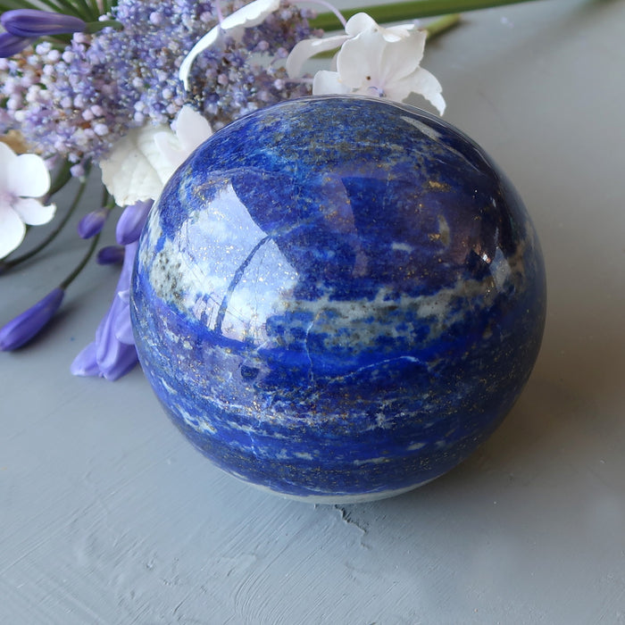 lapis sphere and blue flowers