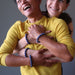 laughing couple hugging wearing lapis lazuli stretch bracelets on each hand