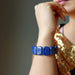 sheila of satin crystals wearing rounded rectangle lapis beaded stretch bracelet