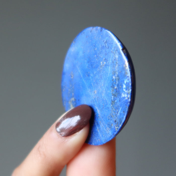 side view of lapis circle cabochon