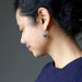 woman wearing lapis lazuli sterling silver earrings
