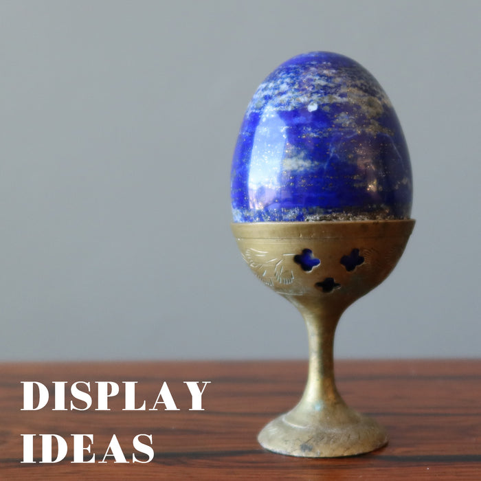 lapis egg on metal display stand