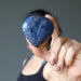 Denim Lapis heart in front of face