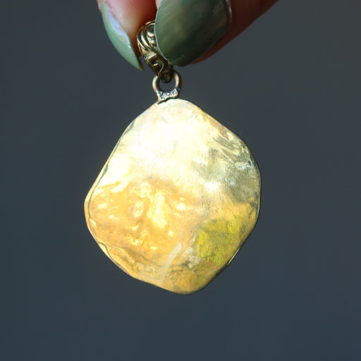 back of lapis brass hammered pendant
