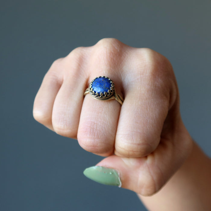 lapis antique brass ring on hand