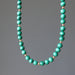 green malachite necklace with gold accent beads