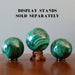 malachite spheres on stands