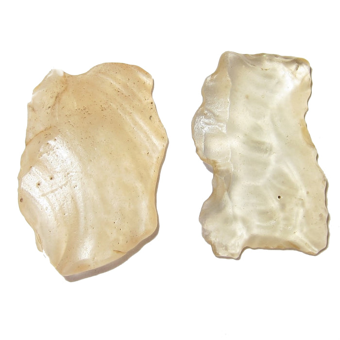 A pair of clear Libyan Desert Glass Impactite Meteorites offered by Satin Crystals