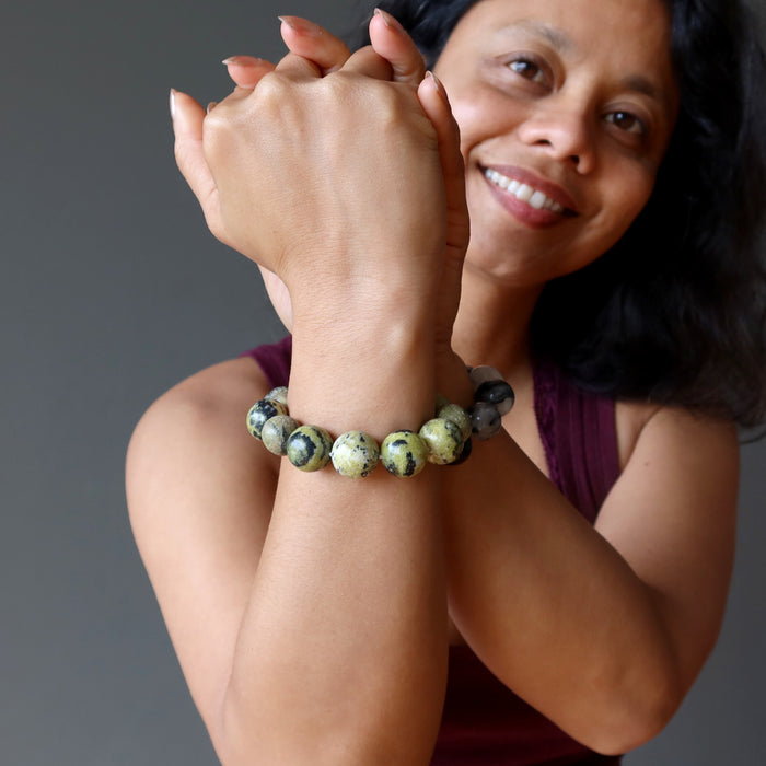 woman wearing serpentine bracelet
