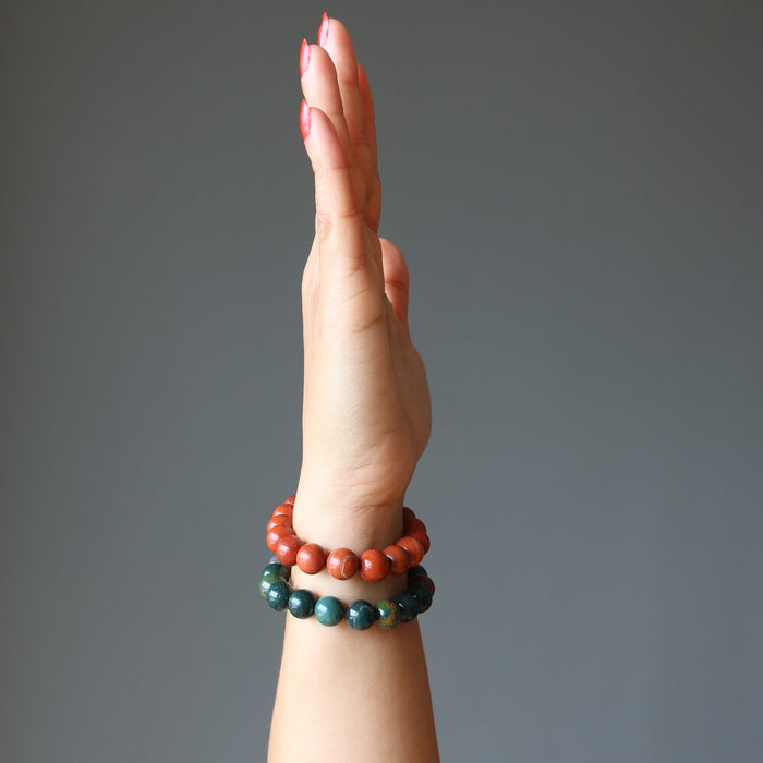 showing Red Jasper and Green Bloodstone beaded stretch bracelet set on model wrist