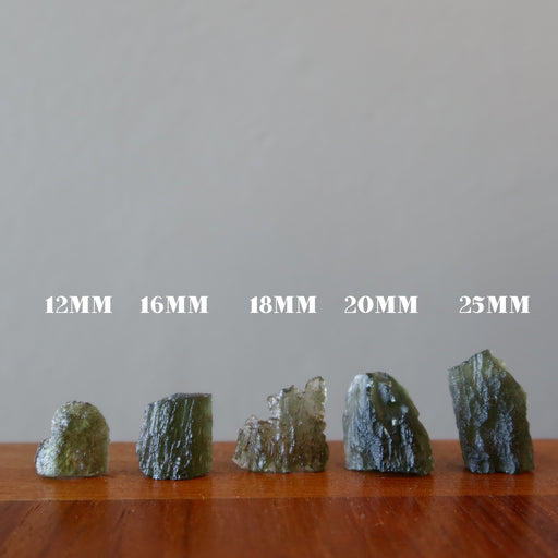 5 standing moldavite rough stones in different sizes