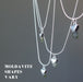 four moldavite necklaces showing moldavite shapes vary