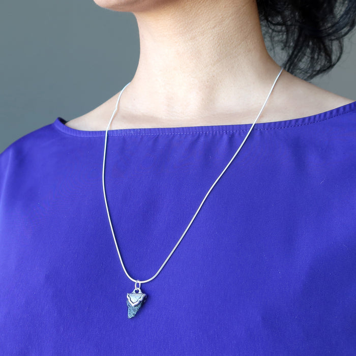 female wearing moldavite sterling silver necklace
