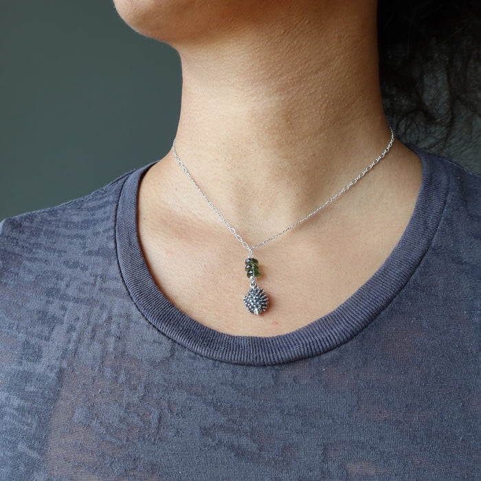 sheila of satin crystals wearing a sterling silver hedgehog moldavite necklace