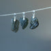 three moldavite pendants on sterling silver chain