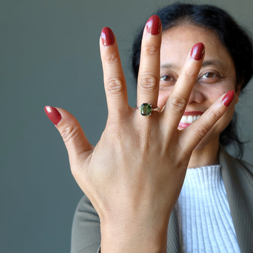 sheila of satin crystals wearing moldavite ring on her finger