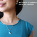 woman modeling moonstone moon necklace and earrings