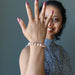 sheila of satin crystals wearing peach  moonstone bracelet 