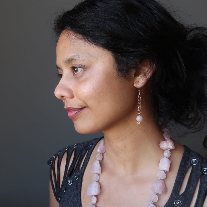 sheila of satin crystals wearing pink moonstone copper chain earrings