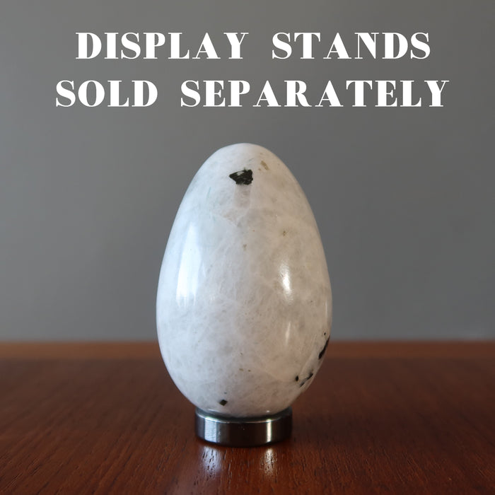  tourmalinated moonstone egg on a hematine ring stand, stand sold separately