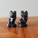 front of two 1" Black Obsidian Cats on wooden table