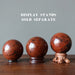 mahogany obsidian spheres on stands