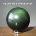 green sheen rainbow obsidian sphere on stand which is sold separately