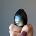 sheen obsidian egg on fist
