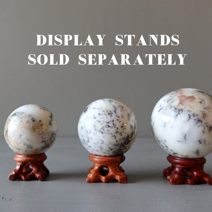 3 white opal sphere on wood display stands