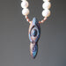 rainbow raku goddess pendant on pearl necklace