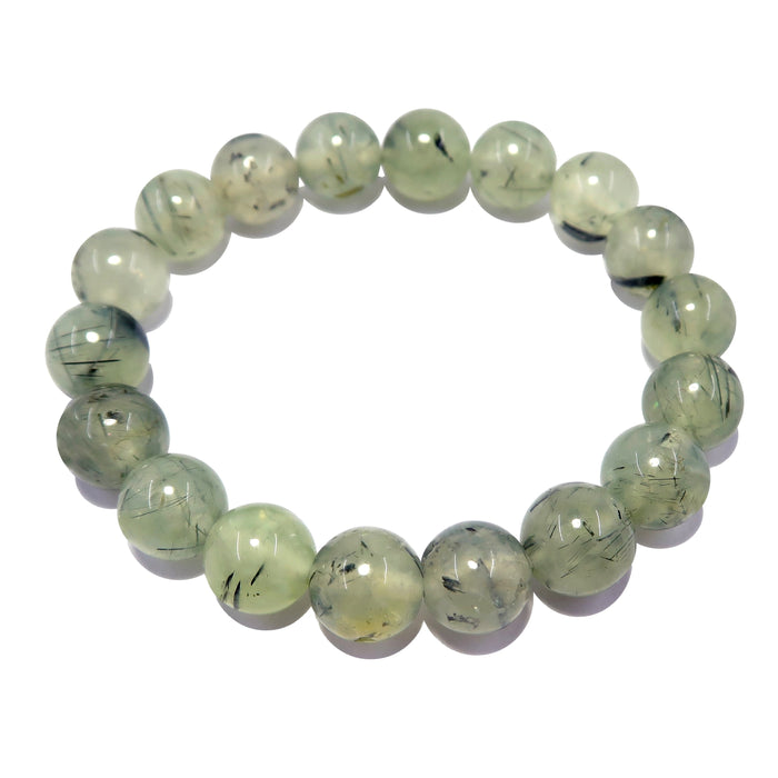 genuine pale green prehnite bracelet featuring black tourmaline mineral inclusions, polished into smooth round beads on stretch cord.