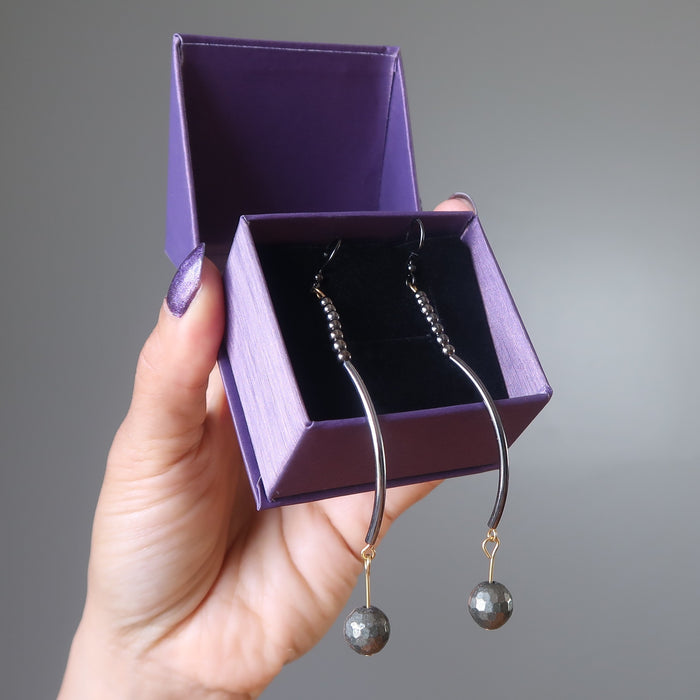 faceted pyrite on long curved earrings in purple satin crystals gift box