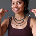 sheila of satin crystals layering pyrite oval necklaces