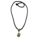 raw pyrite crystal on gold bail on twisted black necklace
