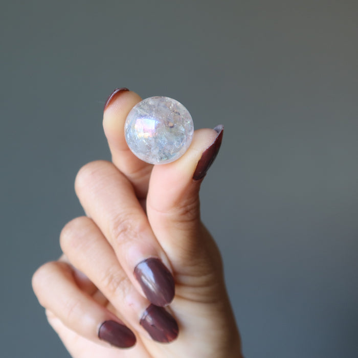 holding aura quartz ball