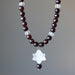clear quartz merkaba pendant on beaded faceted brown chalcedony necklace