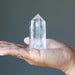 faceted Clear Quartz Wand Tower on the palm