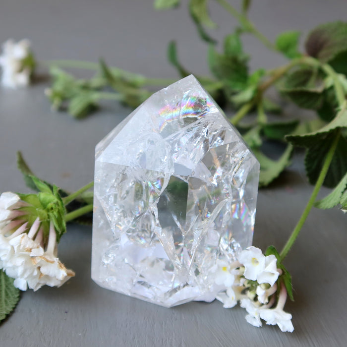 Rainbow Crackle Quartz Point Wand Tower with white flowers