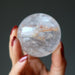 hand holding iron quartz sphere