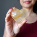 sheila of satin crystals holding Golden Quartz Heart