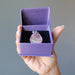 clear quartz with red fire inclusions in teardrop pendant in satin crystals purple gift box