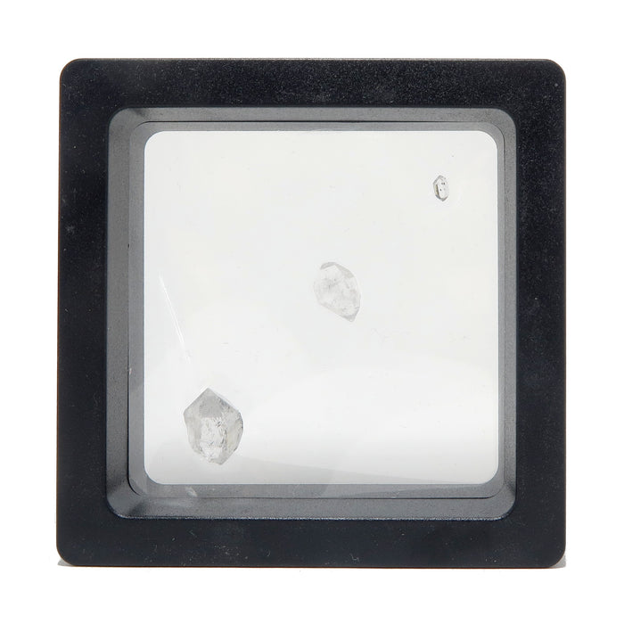 3 Double Terminated Raw Clear Quartz gemstones in zero gravity case