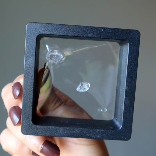 3 Double Terminated Raw Clear Quartz gemstones in zero gravity case