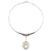 clear quartz sphere in silver cage pendant on silver choker necklace