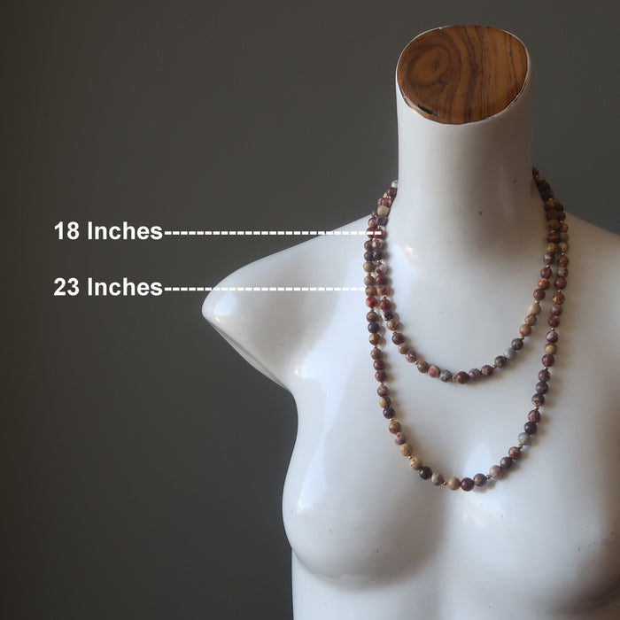 mannequin wearing two rhyolite necklaces showing length difference