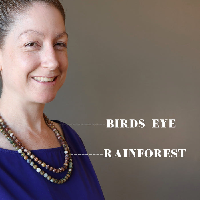 female wearing birds eye and rainforest rhyolite necklace