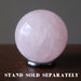 rose quartz sphere on hematine ring stand which is sold separately